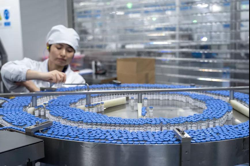 智飞龙科马外包间的包装线